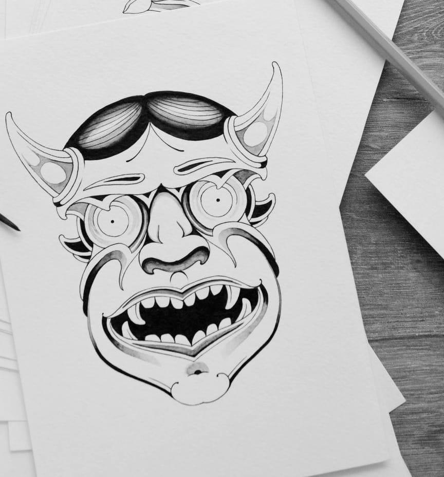 Flash drawing of a hannya mask with horns and bared teeth