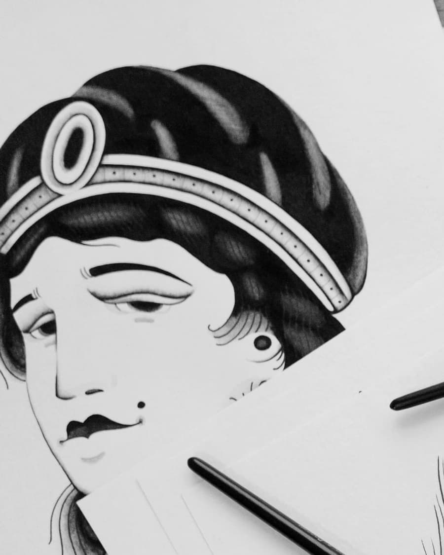 Flash drawing of a woman's face under a jewelled headband