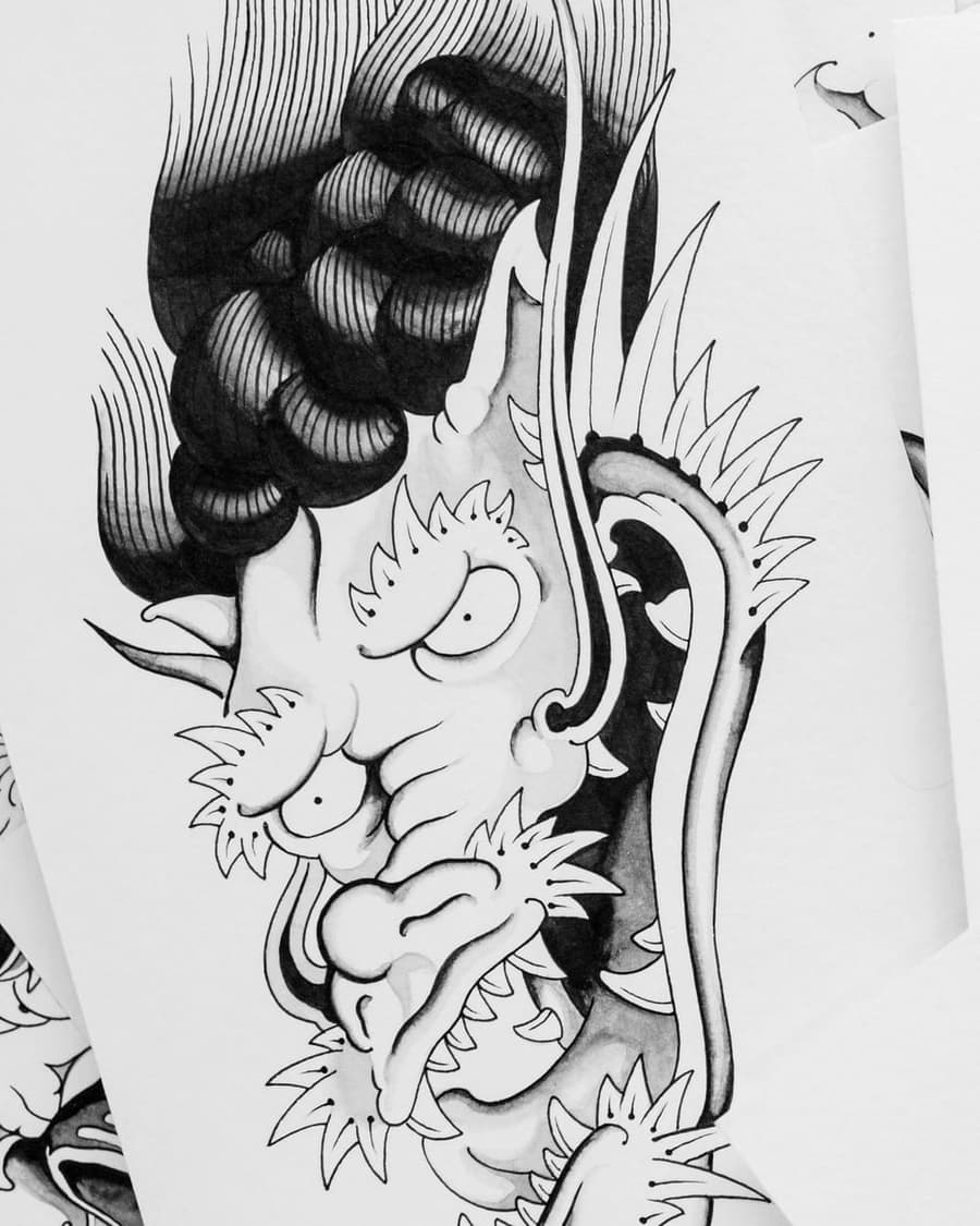 Flash drawing of a dragon's head with a heavy black mane