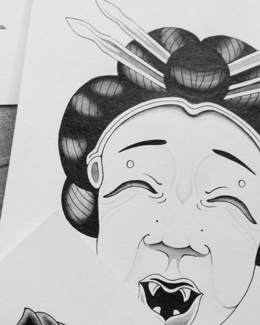 Flash drawing of a laughing geisha mask with hairpins