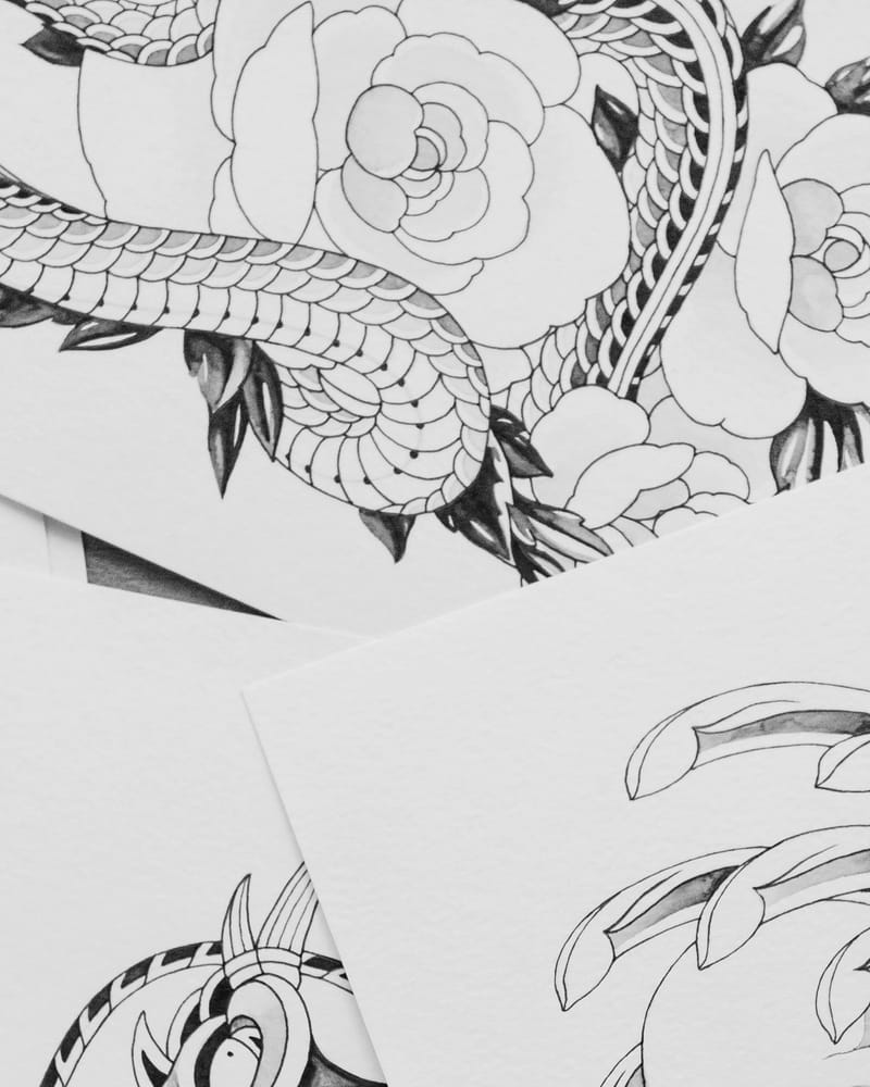 Retired flash drawing of a scaled snake winding through peonies